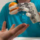Illustration for article titled This cybernetic hand is the first to give amputees a sense of touch